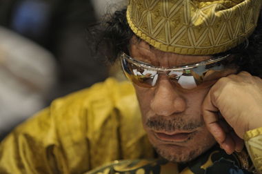 1280px-Muammar_al-Gaddafi%2C_12th_AU_Summit%2C_090202-N-0506A-324.jpg